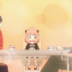 The Forger family—Yor, Anya, and Loid—sit happily together at their dinner table.